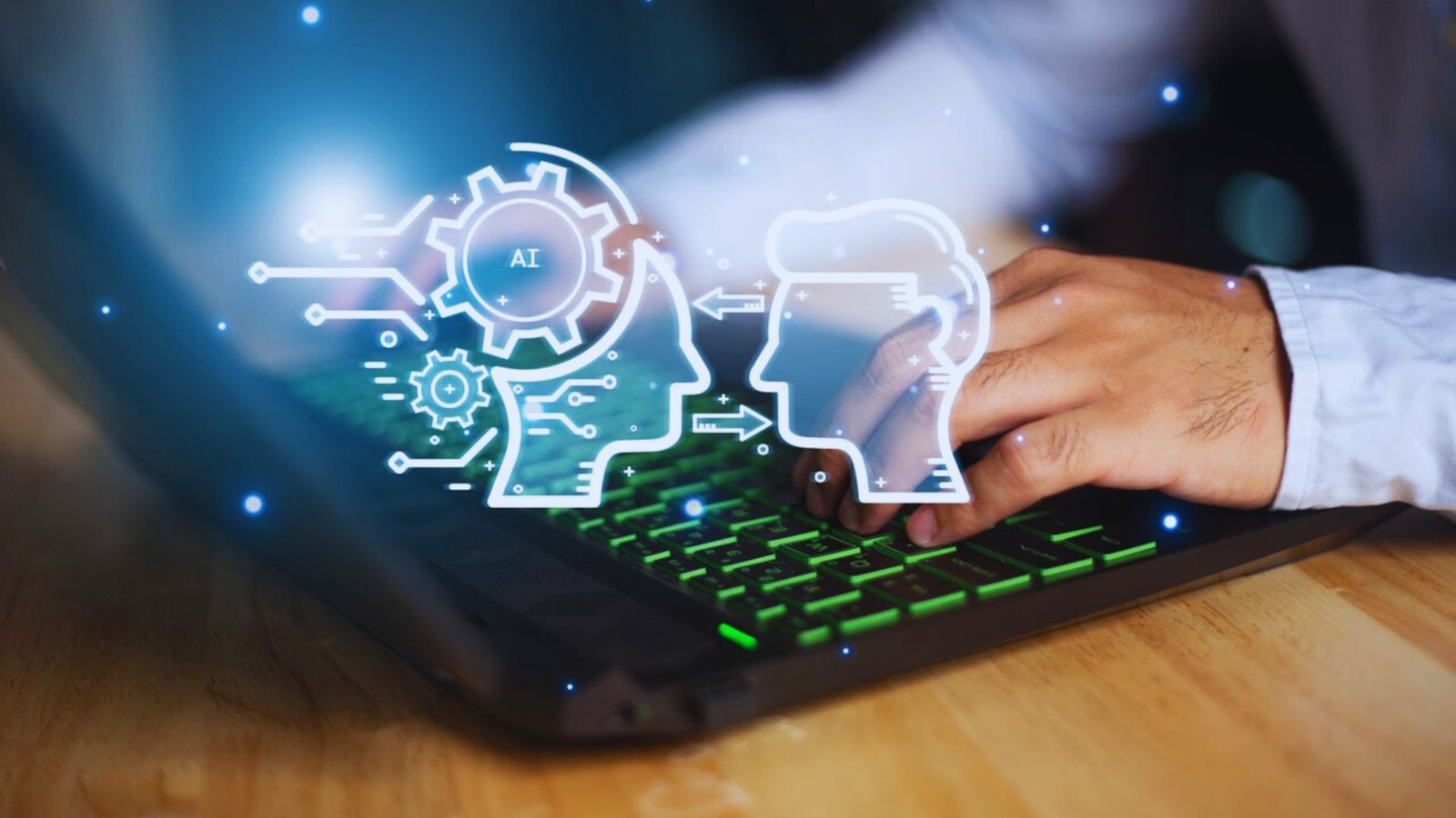  A person typing on a laptop, with an illustration of a brain and a head in the background, symbolizing thought and creativity.