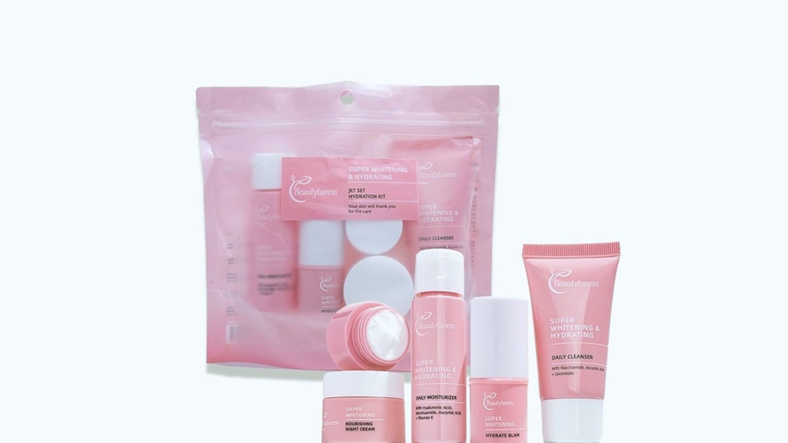  Skin care kit featuring a pink bag and a white tube, ideal for organizing beauty essentials.
