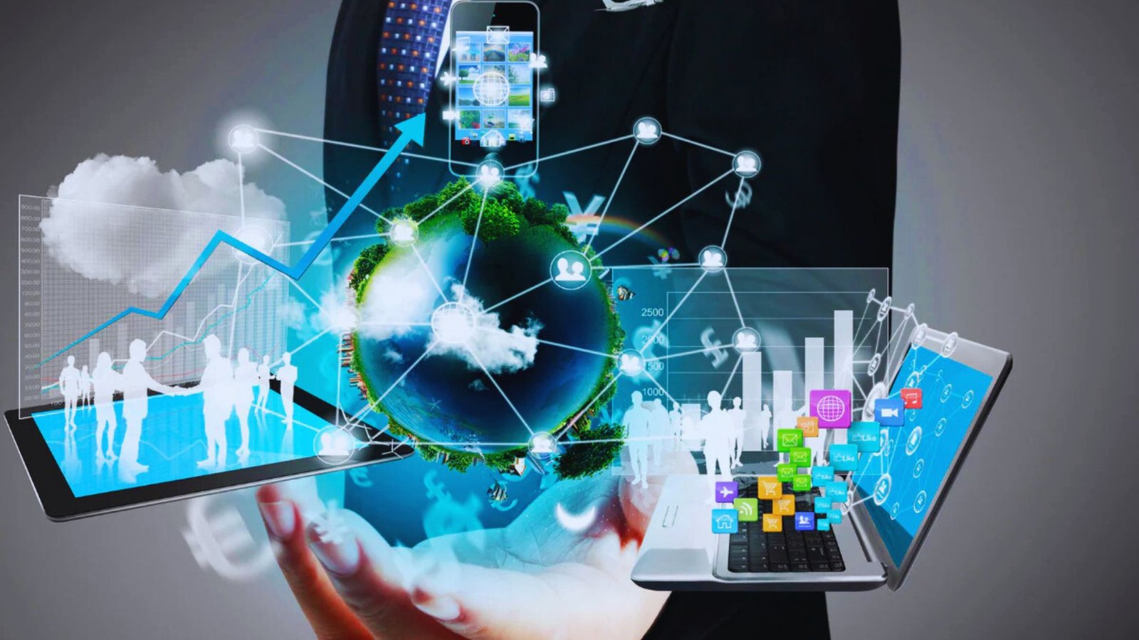 Businessman holding a laptop and tablet, surrounded by various internet icons representing digital connectivity.