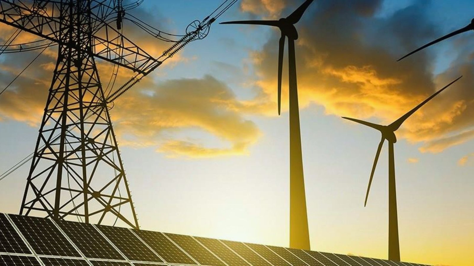Wind turbines and solar panels silhouetted against a vibrant sunset sky, highlighting renewable energy sources.
