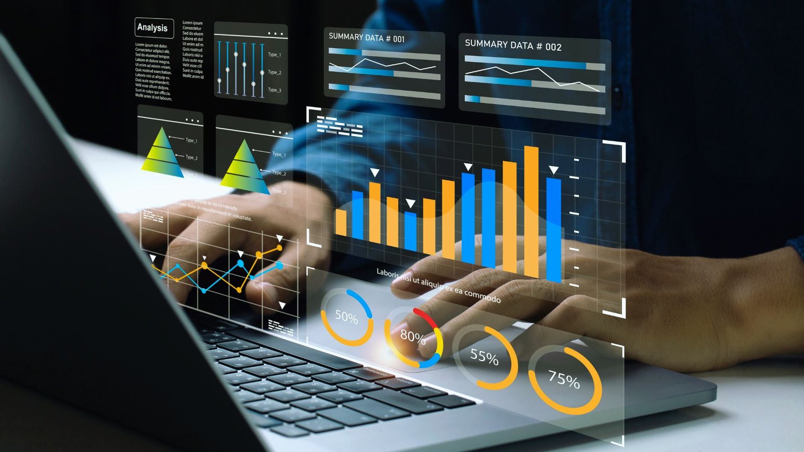 A person typing on a laptop, with various graphs displayed on the screen, indicating data analysis or reporting.
