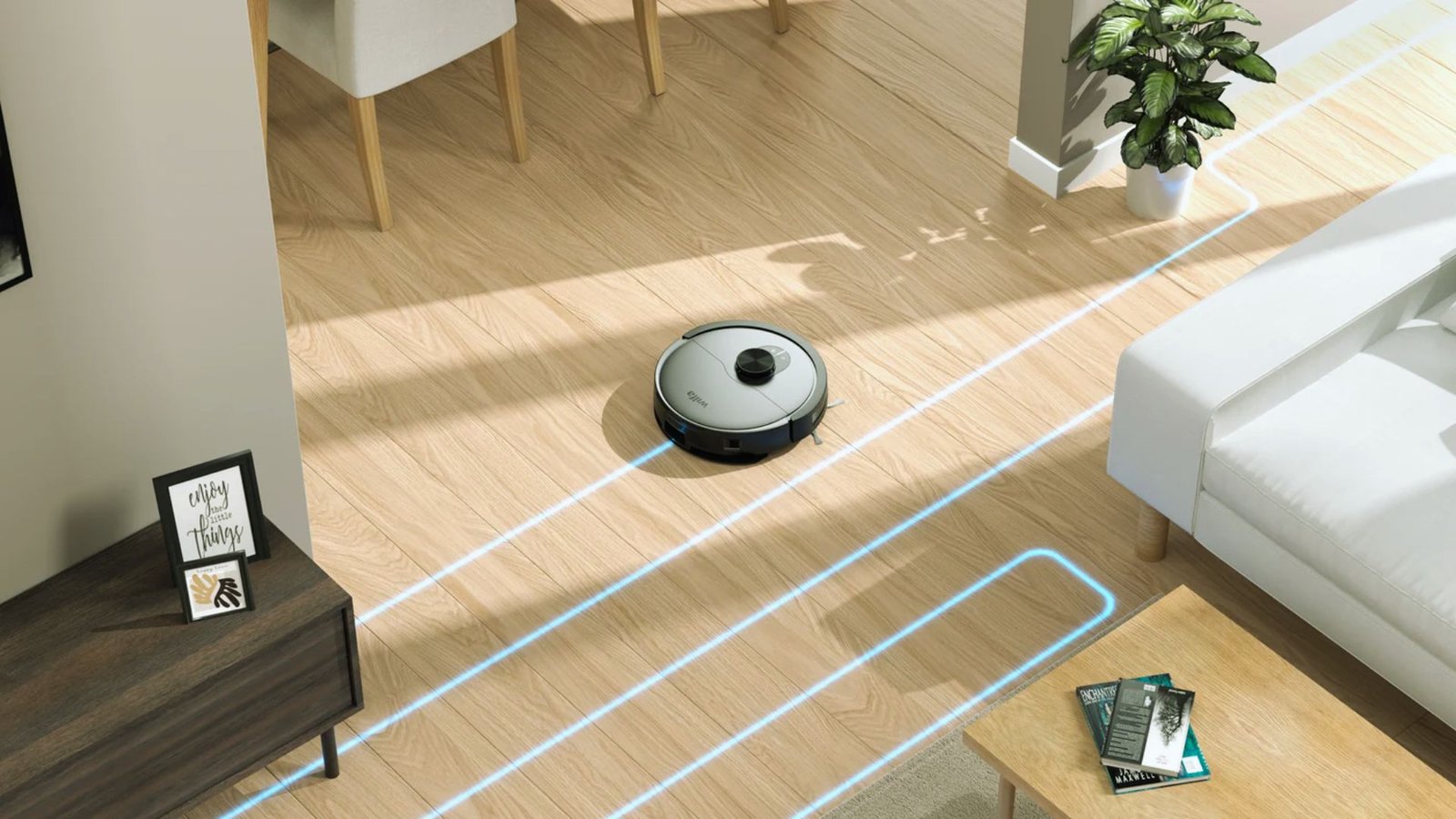  A robot vacuum cleaner operates on the floor of a tidy living room, efficiently removing dust and debris.