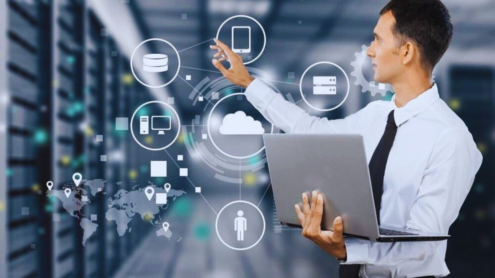Man in a business suit holds a laptop displaying various data icons, symbolizing technology and analytics.