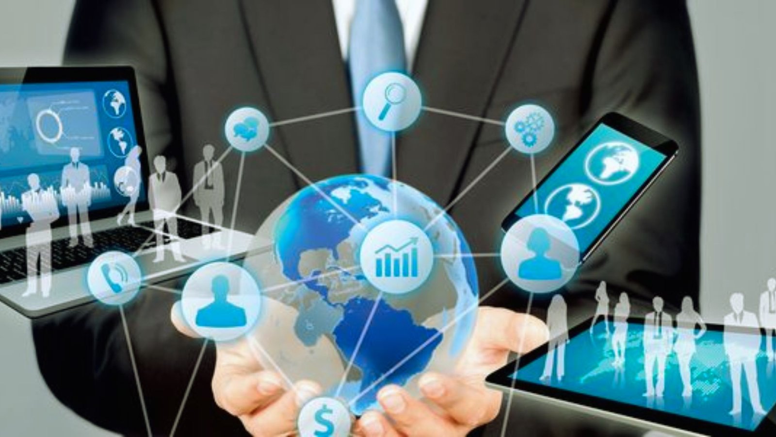 Businessman holding a laptop and mobile devices, surrounded by social media icons representing digital connectivity.