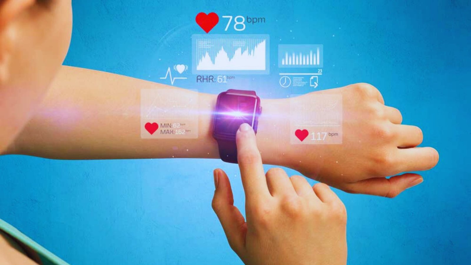 A woman holds her wrist up, showcasing a smart watch on her arm.
