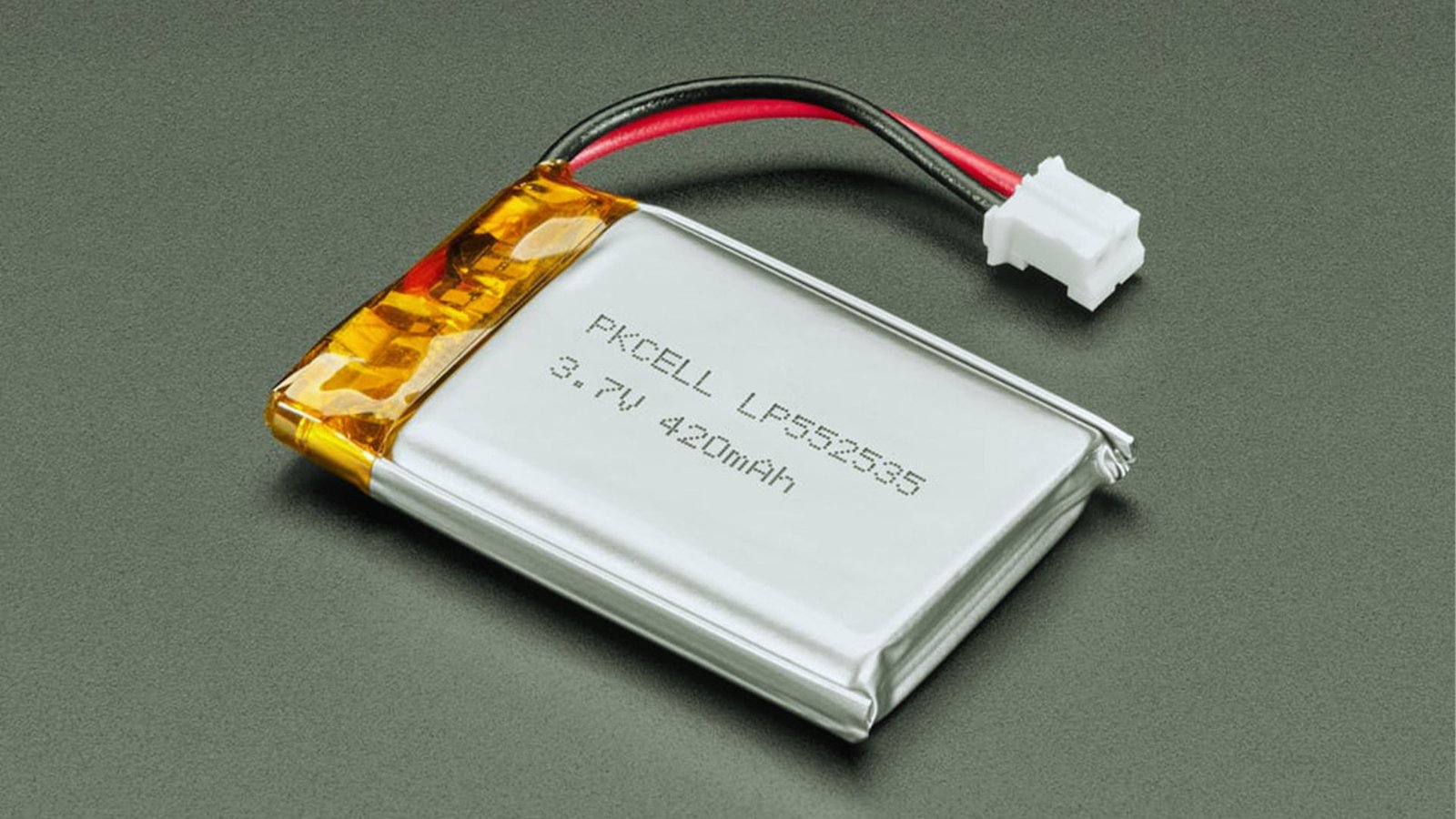  A battery connected to a wire, illustrating a basic electrical component setup.